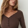 Blusa con botones Blusa con botones