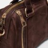 Bolso bandolera con detalles de cremallera