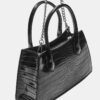 Bolso bandolera tipo trapecio con efecto coco