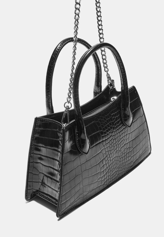 Bolso bandolera tipo trapecio con efecto coco