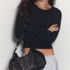 Bolso con tachuelas