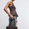 Bolso de bolos con detalles metálicos