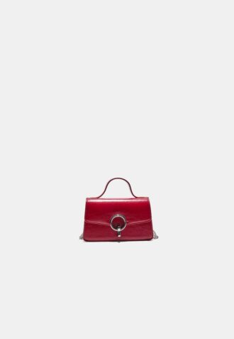 Bolso de hombro con cierre redondo
