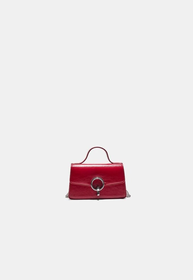 Bolso de hombro con cierre redondo Bolso de hombro con cierre redondo