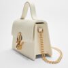 Bolso de hombro con cierre redondo Bolso de hombro con cierre redondo