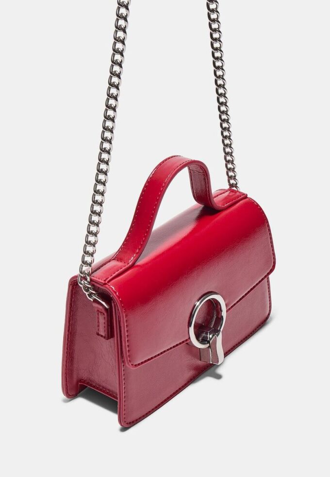 Bolso de hombro con cierre redondo Bolso de hombro con cierre redondo