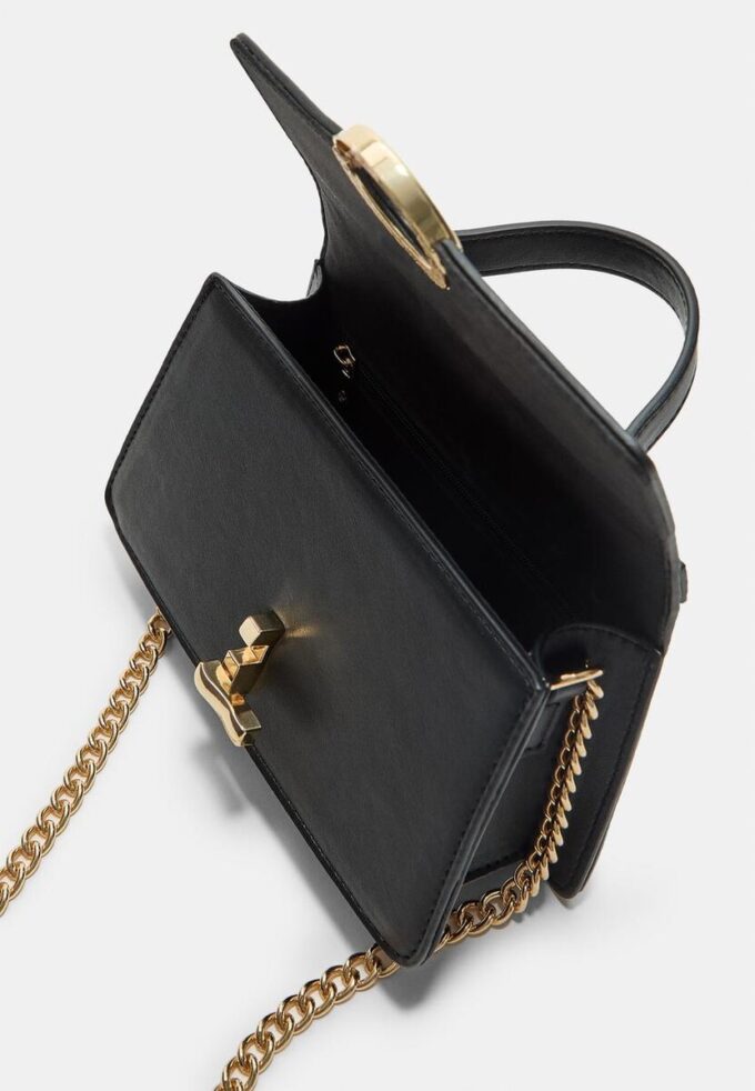 Bolso de hombro con cierre redondo Bolso de hombro con cierre redondo