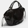 Bolso shopper redondo con detalles metálicos