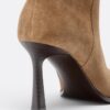 Botas altas de tacón de aguja slouchy de piel