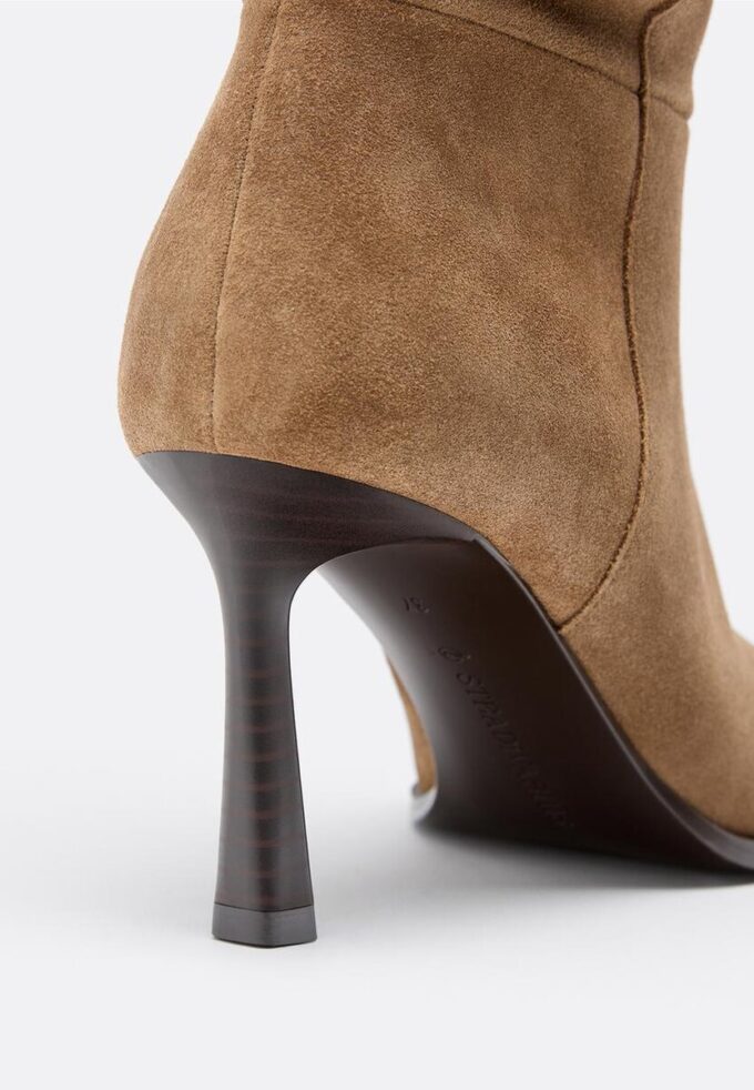 Botas altas de tacón de aguja slouchy de piel