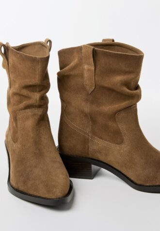 Botines de piel estilo cowboy slouchy