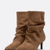 Botines de tacón de piel holgados