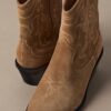 Botines vaqueros de piel serraje