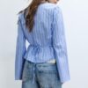 Camisa ajustada con nudo Camisa ajustada con nudo