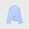 Camisa ajustada con nudo Camisa ajustada con nudo