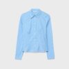 Camisa entallada con costura bajo el pecho Camisa entallada con costura bajo el pecho