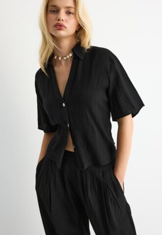 Camisa holgada con botones