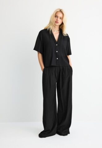 Camisa holgada con botones