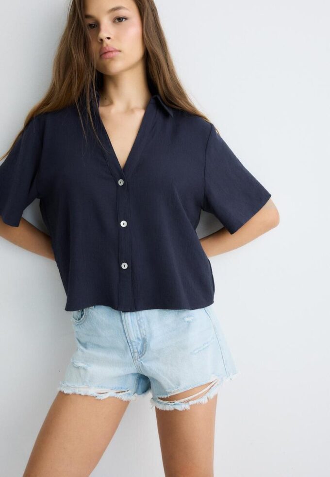 Camisa holgada con botones Camisa holgada con botones