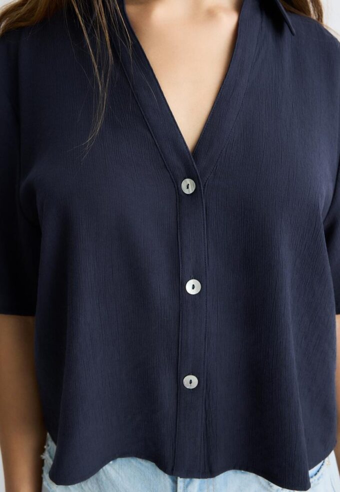 Camisa holgada con botones Camisa holgada con botones