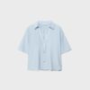Camisa holgada con botones Camisa holgada con botones