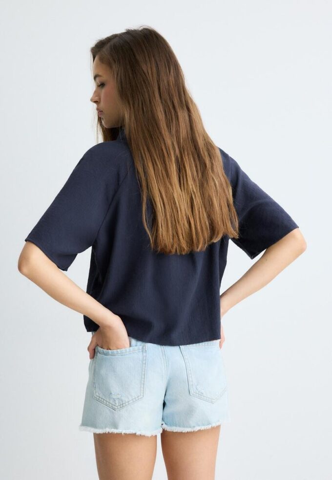 Camisa holgada con botones Camisa holgada con botones