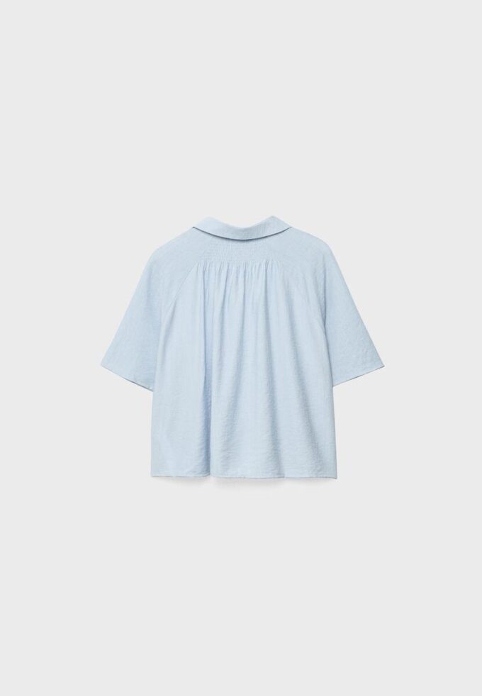 Camisa holgada con botones Camisa holgada con botones