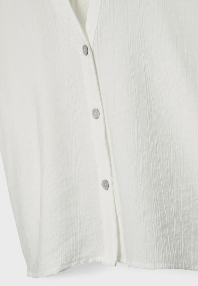 Camisa holgada con botones Camisa holgada con botones