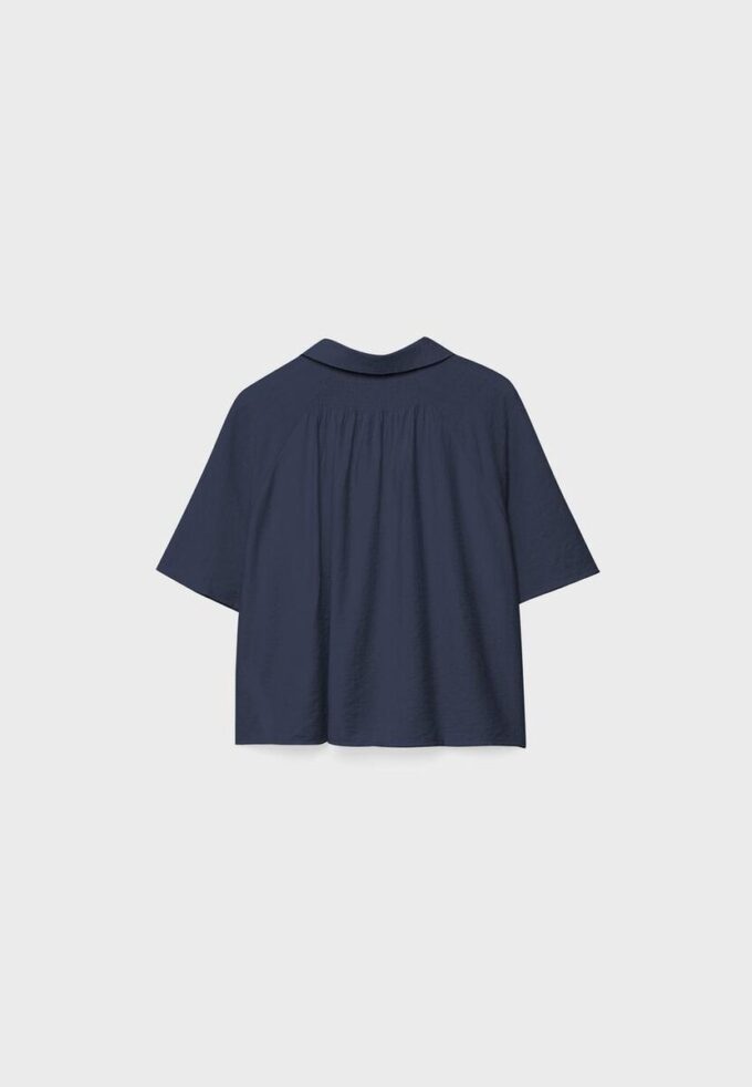 Camisa holgada con botones Camisa holgada con botones
