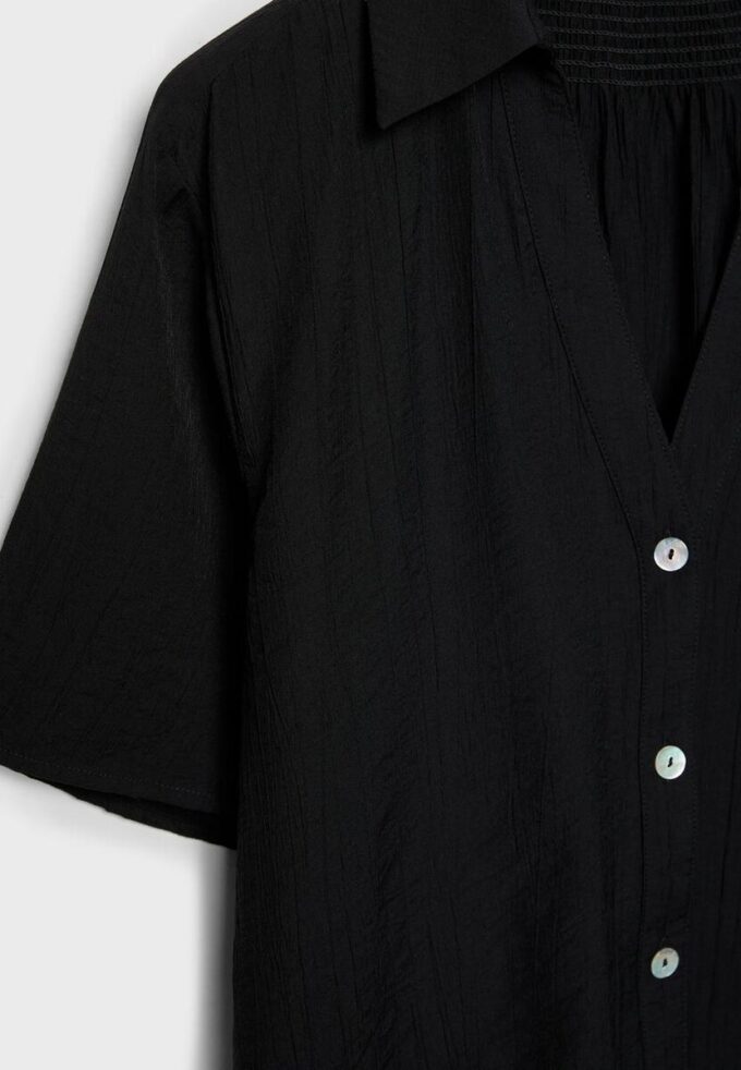 Camisa holgada con botones Camisa holgada con botones