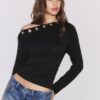 Camiseta asimétrica con ojales Camiseta asimétrica con ojales