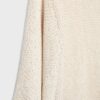Cardigan de punto con mangas murciélago y lazo