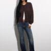 Cardigan de punto trenzado con botones Cardigan de punto trenzado con botones