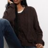 Cardigan de punto trenzado con botones Cardigan de punto trenzado con botones