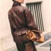 Chaqueta de piel con bolsillos y cintura ajustable Chaqueta de piel con bolsillos y cintura ajustable