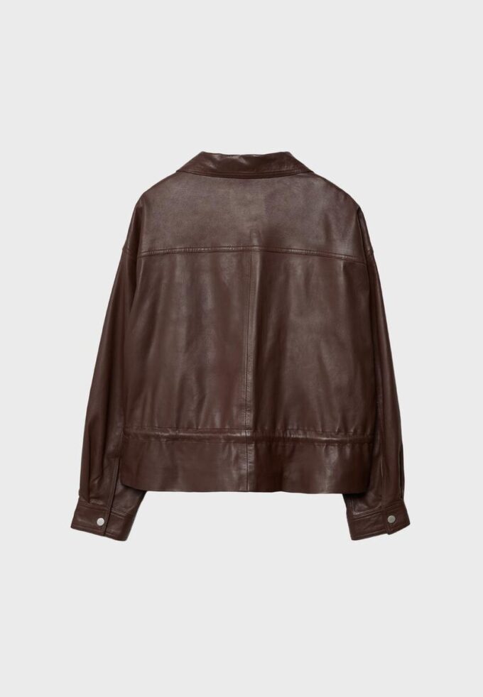 Chaqueta de piel con bolsillos y cintura ajustable Chaqueta de piel con bolsillos y cintura ajustable