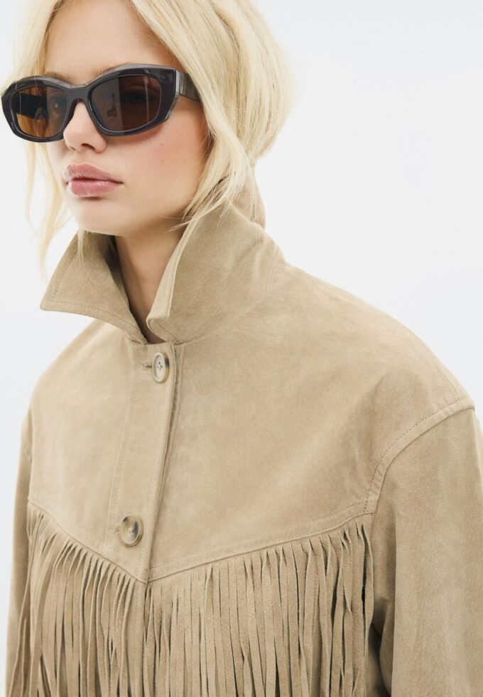 Chaqueta de piel con flecos Chaqueta de piel con flecos