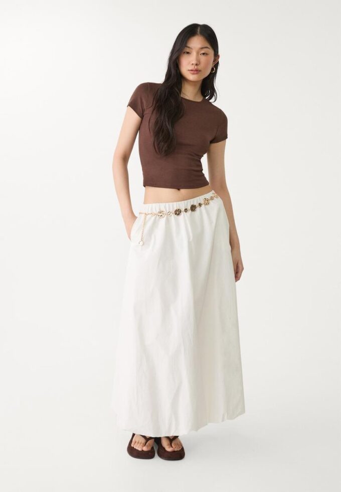 Cinturón de metal con placas redondas