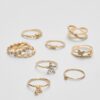 Conjunto de 9 anillos de mariposa y diamantes de imitación