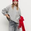 Gorro de punto acanalado con placa