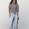 Jeans de corte acampanado y cintura baja Jeans de corte acampanado y cintura baja