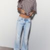 Jeans de corte acampanado y cintura baja Jeans de corte acampanado y cintura baja