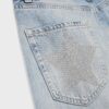 Jeans de talle bajo y pierna Wide Leg con detalle de estrella Jeans de talle bajo y pierna Wide Leg con detalle de estrella