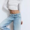 Jeans de talle bajo y pierna Wide Leg con detalle de estrella Jeans de talle bajo y pierna Wide Leg con detalle de estrella