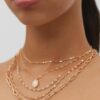 Lote de 5 collares con dijes de piedra rosa