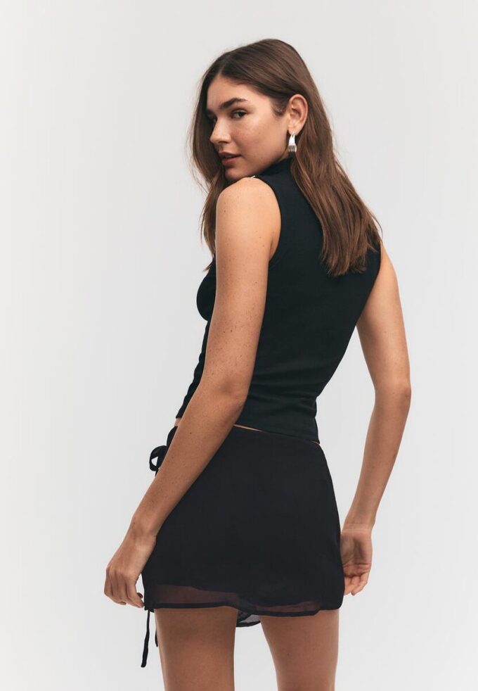 Mini Skort cruzada con bordados Mini Skort cruzada con bordados