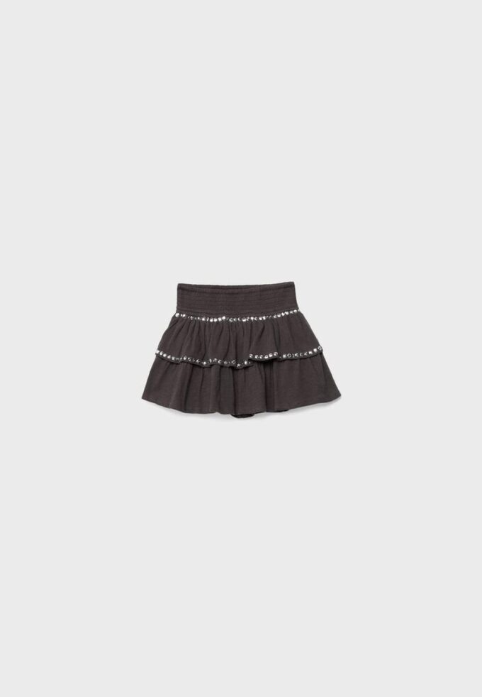 Minifalda con volantes y tachuelas Minifalda con volantes y tachuelas