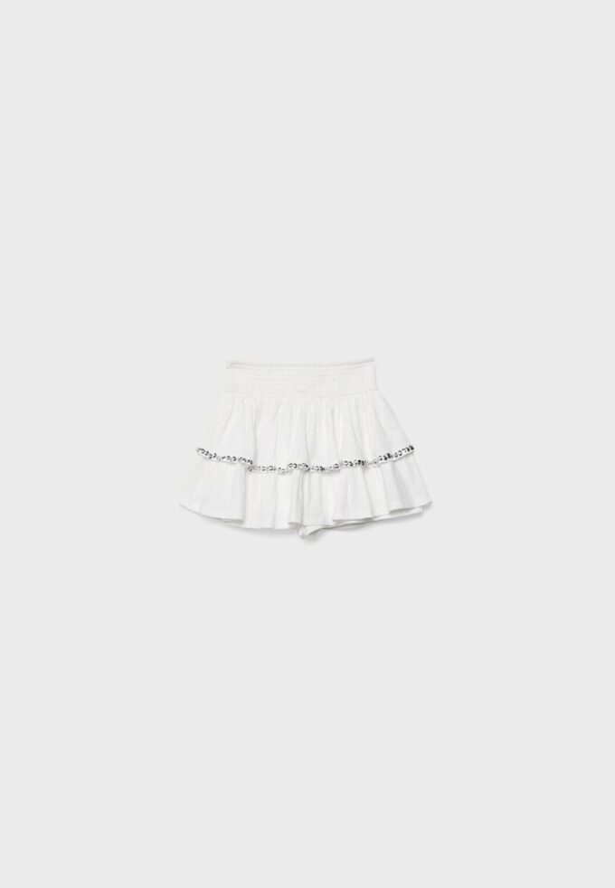 Minifalda con volantes y tachuelas Minifalda con volantes y tachuelas