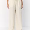 Pantalones con efecto lino y hilos metálicos fluidos Pantalones con efecto lino y hilos metálicos fluidos