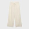 Pantalones con efecto lino y hilos metálicos fluidos Pantalones con efecto lino y hilos metálicos fluidos